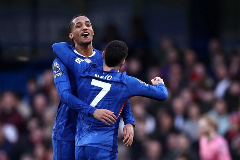 Chelsea's Brazilian striker #20 Joao Pedro celebrates scoring the team's first goal alongside Chelsea's Portuguese midfielder #07 Pedro Neto during the English Premier League football match between Chelsea and Brentford at Stamford Bridge in London on January 17, 2026.  Henry NICHOLLS / AFP