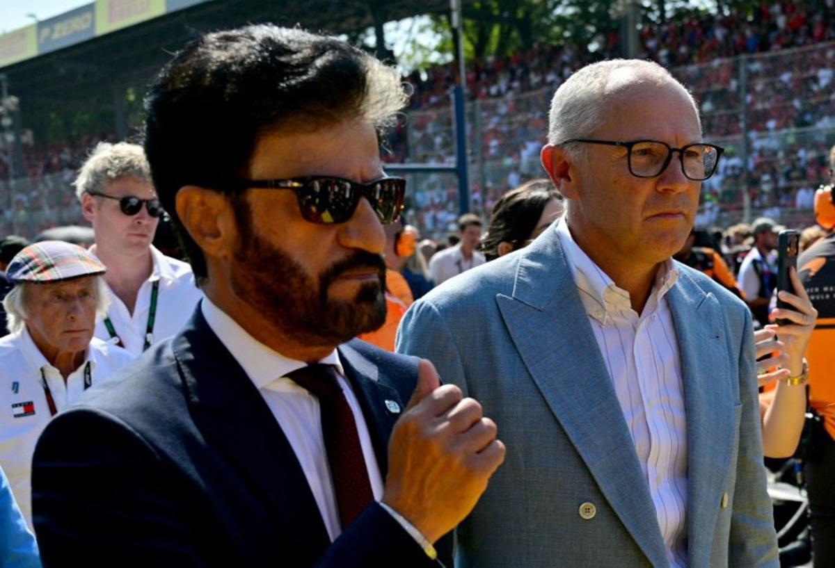 FIA President Mohammed Ben Sulayem (L) walks with Italian CEO of the Formula One Group Stefano Domenicali ahead of the Italian Formula One Grand Prix at the Autodromo Nazionale Monza circuit in Monza, northern Italy on September 6, 2026.  Andrej ISAKOVIC / AFP