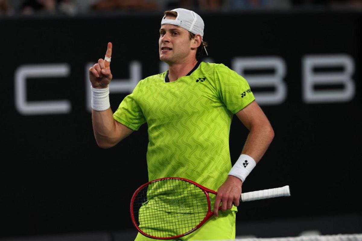 Belgium's Zizou Bergs reacts after a point against Poland's Hubert Hurkacz during their men's singles match on day three of the Australian Open tennis tournament in Melbourne on January 20, 2026.  IZHAR KHAN / AFP