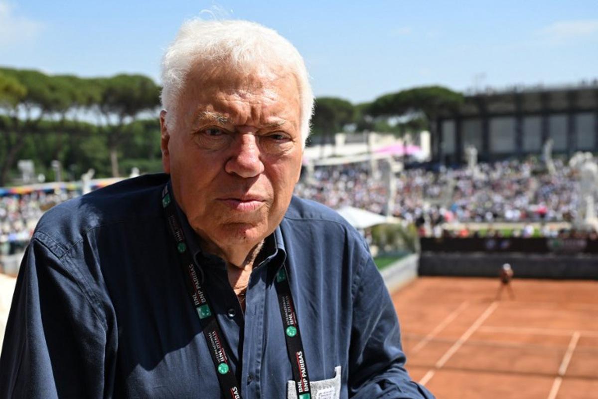Former Italian tennis player Nicola Pietrangeli poses at the ATP Rome Open tennis tournament on May 11, 2022 at Foro Italico in Rome. Nicola Pietrangeli, an Italian tennis legend with victories at the French Open and the Davis Cup, told AFP he is delighted with the emergence of a new Azzurri wave, embodied by Jannik Sinner, whom he "sees in the top five in the world at the end of the year". Andreas SOLARO / AFP