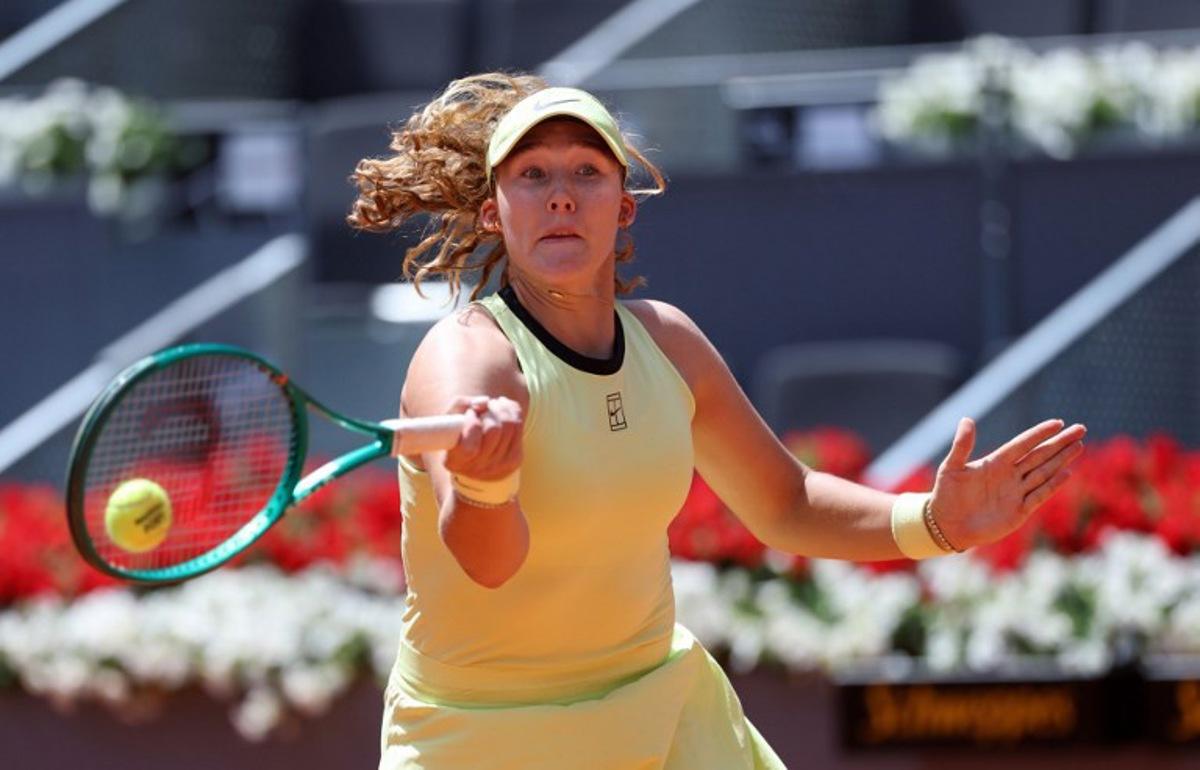 Russia's Mirra Andreeva returns the ball to Canada's Leylah Fernandez during their 2026 WTA Tour Madrid Open tennis tournament women's singles match at the Caja Magica in Madrid, on April 28, 2026.   Thomas COEX / AFP