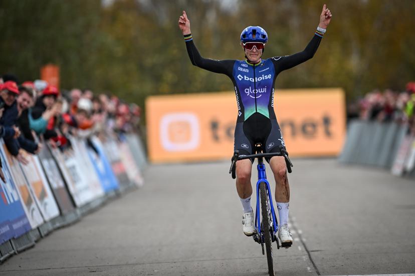 Dutch Lucinda Brand celebrates as she crosses the finish line to win the women's elite race at the 'Jaarmarktcross' cyclocross cycling event in Niel, race 3/8 of the Superprestige competition, on Tuesday 11 November 2025. BELGA PHOTO DAVID PINTENS