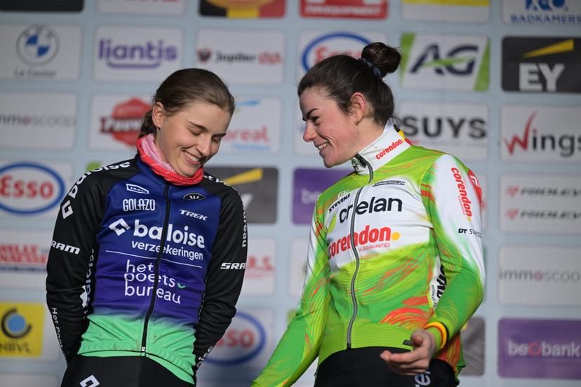 L-R, second Belgian Fleur Moors and winner Belgian Marion Norbert Riberolle celebrate on the podium of the Women elite race at the Belgian Cyclocross Championships in Beringen on Saturday 10 January 2026. BELGA PHOTO DAVID PINTENS