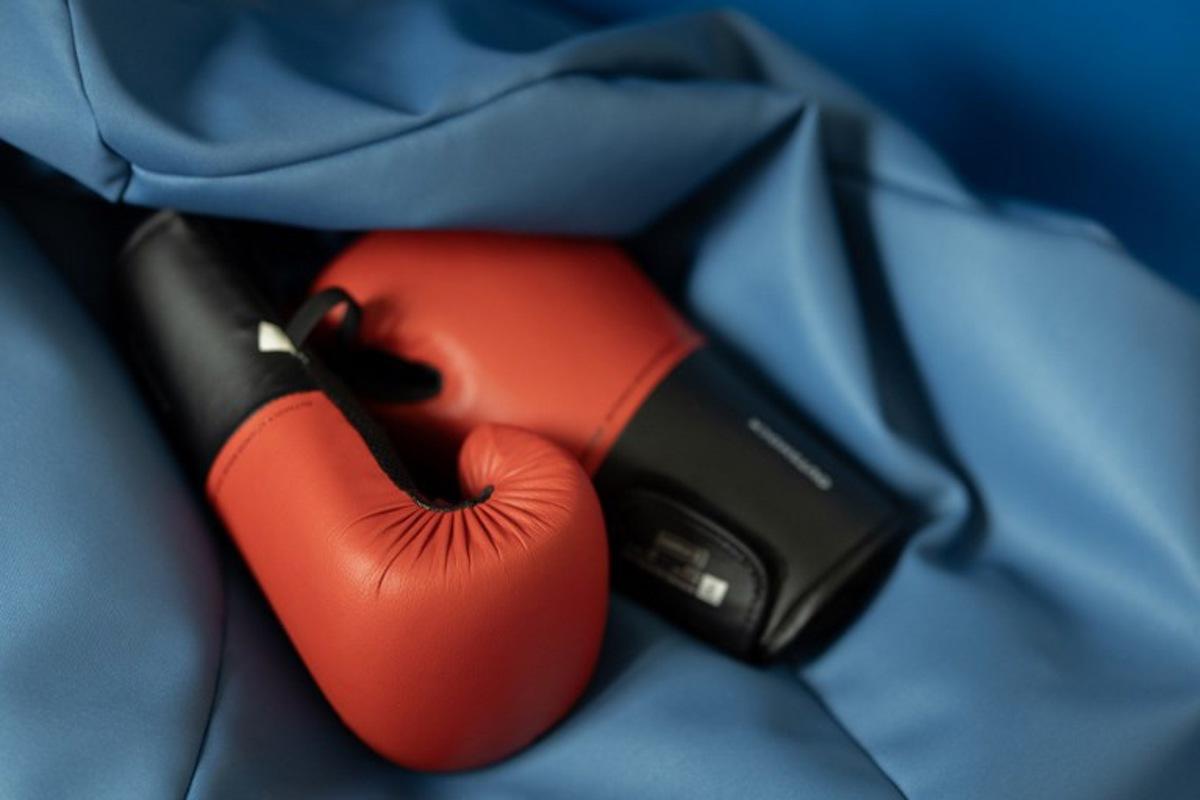 This photograph shows boxing gloves in a room designed to let off steam in the house MADEO, an experimental place of welcome for children with psycho troubles in Milizac-Guipronvel, western France on January 21, 2026. They are known as the "unplaceables": a handful of teenagers in the care of child welfare services (ASE) whose foster families no longer want them. Near Brest, an experimental program called "Maison Madeo" is attempting to provide them with stability and peace of mind. Fred TANNEAU / AFP