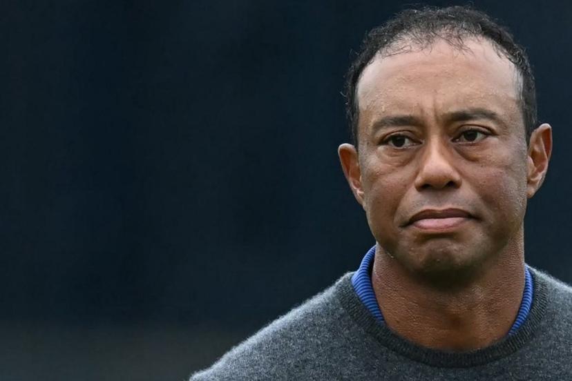 US golfer Tiger Woods reacts on the 18th green after his first round 79 on the opening day of the 152nd British Open Golf Championship at Royal Troon on the south west coast of Scotland on July 18, 2024.  Paul ELLIS / AFP