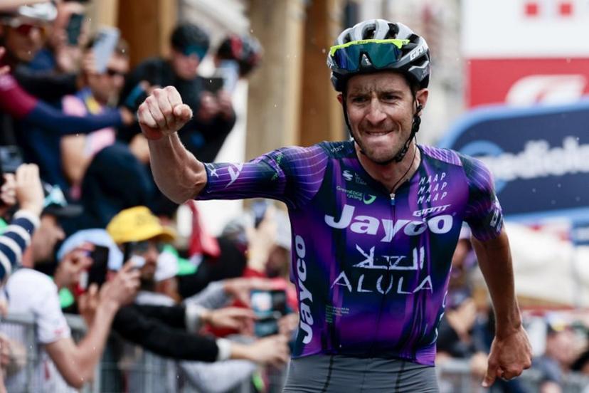 Team Jayco AlUla's Australian rider Chris Harper celebrates as he crosses the finish line to win the 20th stage of the 108th Giro d'Italia cycling race 205kms from Verres to Sestriere on May 31, 2025.  Luca Bettini / AFP