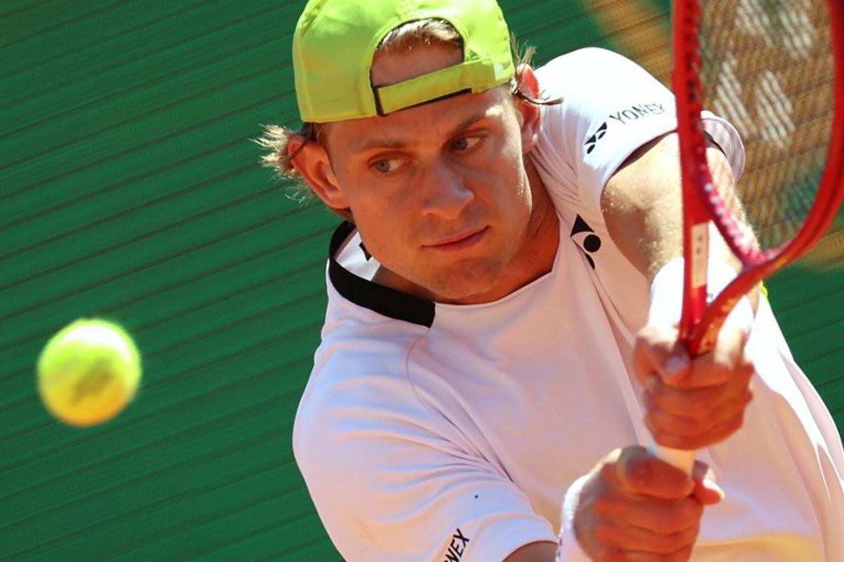 Belgium's Zizou Bergs returns to Germany's Alexander Zverev during their Monte Carlo ATP Masters Series Tournament round of 16 tennis match on Court Rainier III at the Monte-Carlo Country Club in Roquebrune-Cap-Martin, south-eastern France on April 9, 2026.  Valery HACHE / AFP