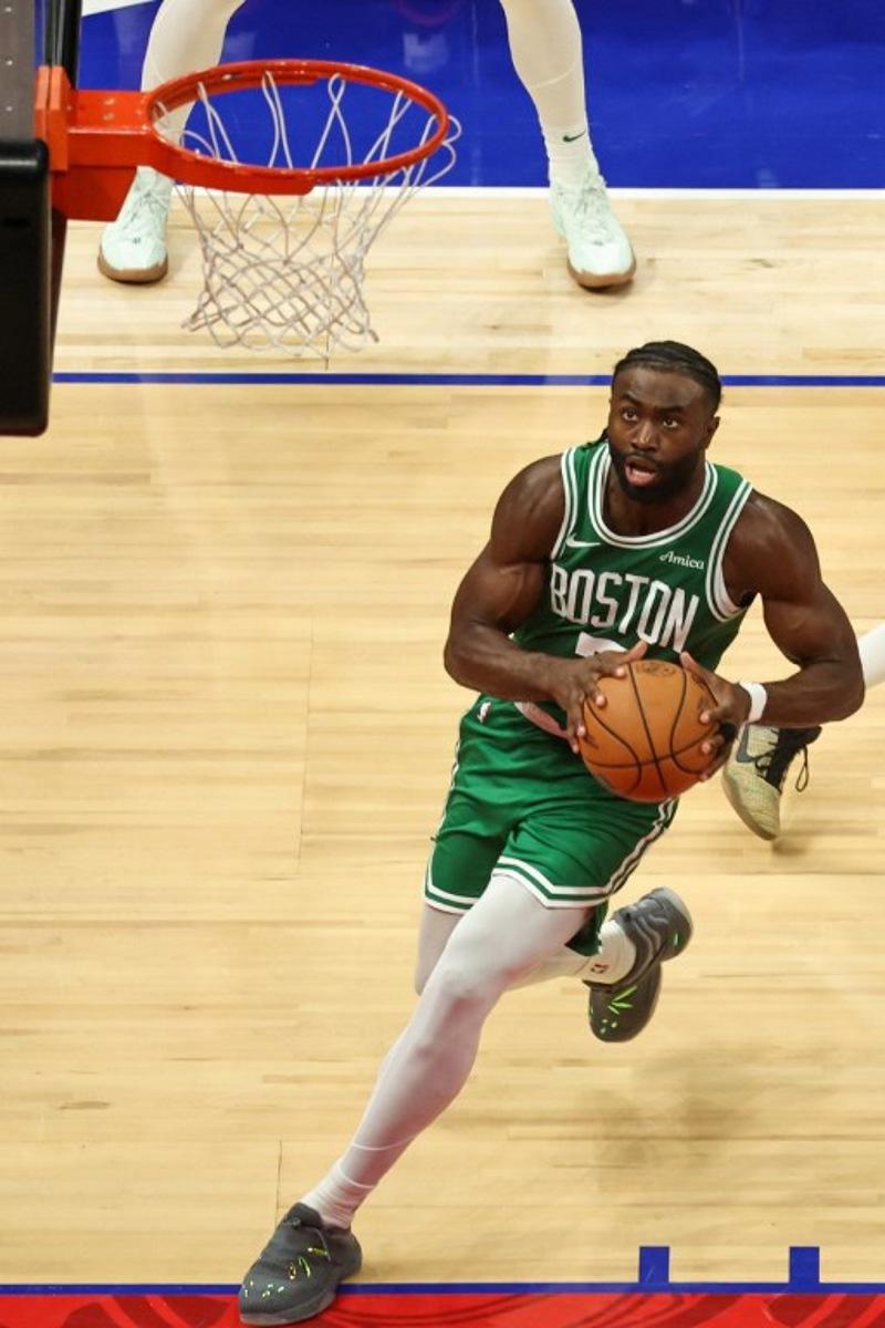 Boston Celtics' forward #07 Jaylen Brown jumps to shoot during the NBA Preseason game between the Boston Celtics and the Denver Nuggets at the Etihad Arena in Abu Dhabi on October 6, 2024.  Fadel Senna / AFP