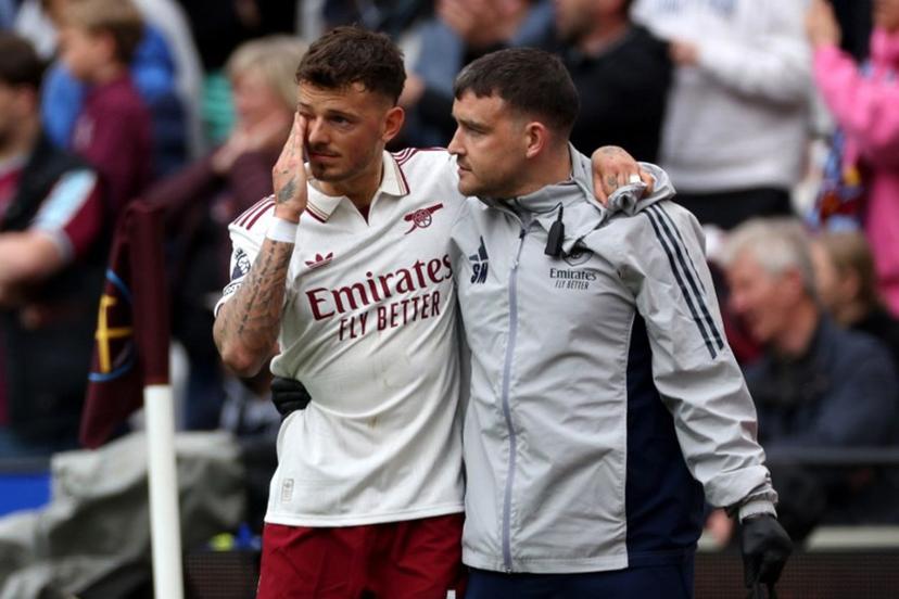 Arsenal's English defender #04 Ben White appears emotional as he leaves the pitch with an injury during the English Premier League football match between West Ham United and Arsenal at the London Stadium, in east London on May 10, 2026.  Adrian Dennis / AFP