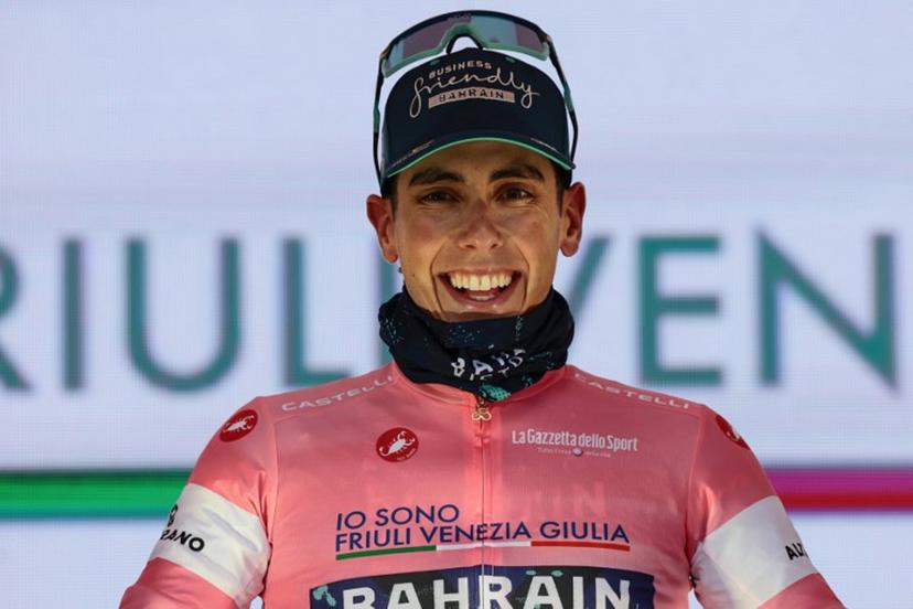 New overall leader Bahrain - Victorious Portuguese rider Afonso Eulalio celebrates on the podium after the 5th stage of the Giro d'Italia 2026 - Tour of Italy cycling race between Praia a Mare and Potenza, southern Italy on May 13, 2026.  Luca BETTINI / AFP