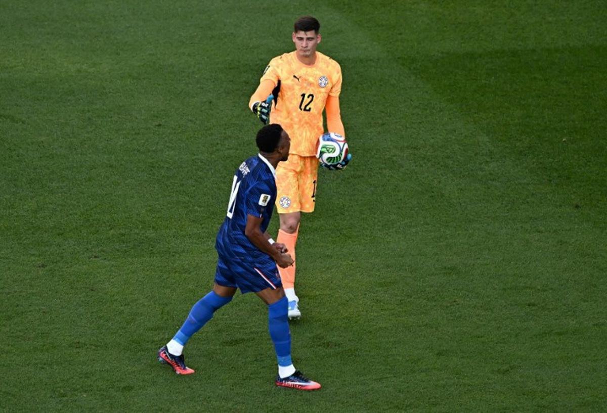 France's forward #10 Kylian Mbappe celebrates next to Paraguay's goalkeeper #12 Orlando Gill after winning the 2026 World Cup round of 16 football match between Paraguay and France at the Philadelphia Stadium in Philadelphia on July 4, 2026.   Jewel SAMAD / AFP