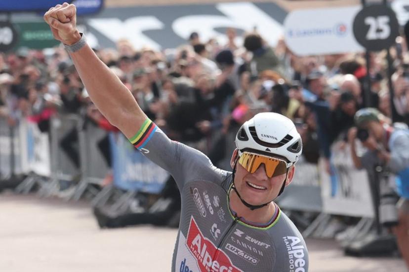 Alpecin-Deceuninck's Dutch rider Mathieu van der Poel celebrates after crossing the finish line to win the 122nd edition of the Paris-Roubaix one-day classic cycling race, 259,2 km between Compiegne and Roubaix, at the Vélodrome André-Pétrieux in Roubaix, northern France on April 13, 2025.  Francois LO PRESTI / AFP