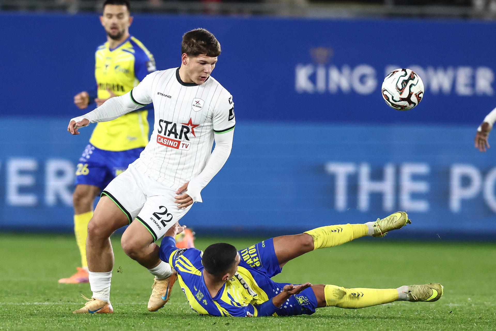 OHL's Jovan Mijatovic and STVV's Ilias Sebaoui fight for the ball during a soccer match between Oud-Heverlee Leuven and STVV, Sunday 23 November 2025 in Leuven, on day 15 of the 2025-2026 'Jupiler Pro League' first division of the Belgian championship. BELGA PHOTO BRUNO FAHY