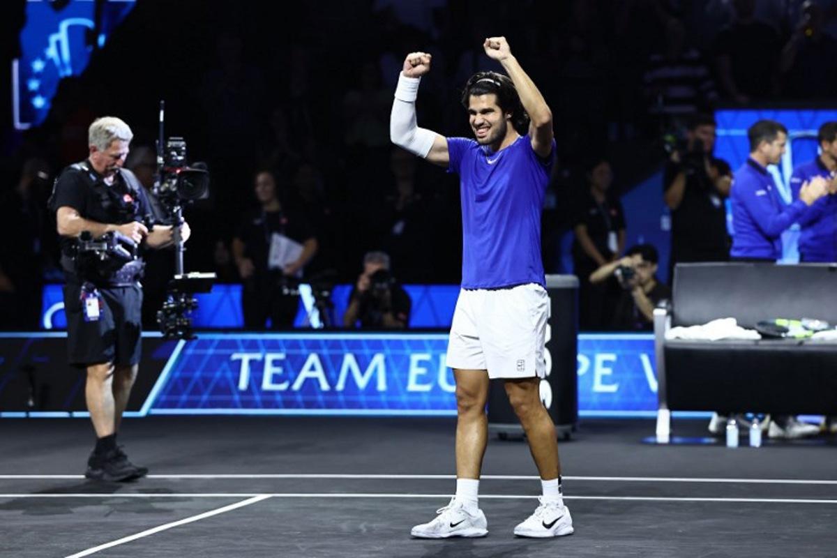 Spain's Carlos Alcaraz of Team Europe celebrates victory against USA's Taylor Fritz of Team World during their 2026 Laver Cup men's singles tennis match, at the O2 Arena in London on September 26, 2026.  Henry Nicholls / AFP