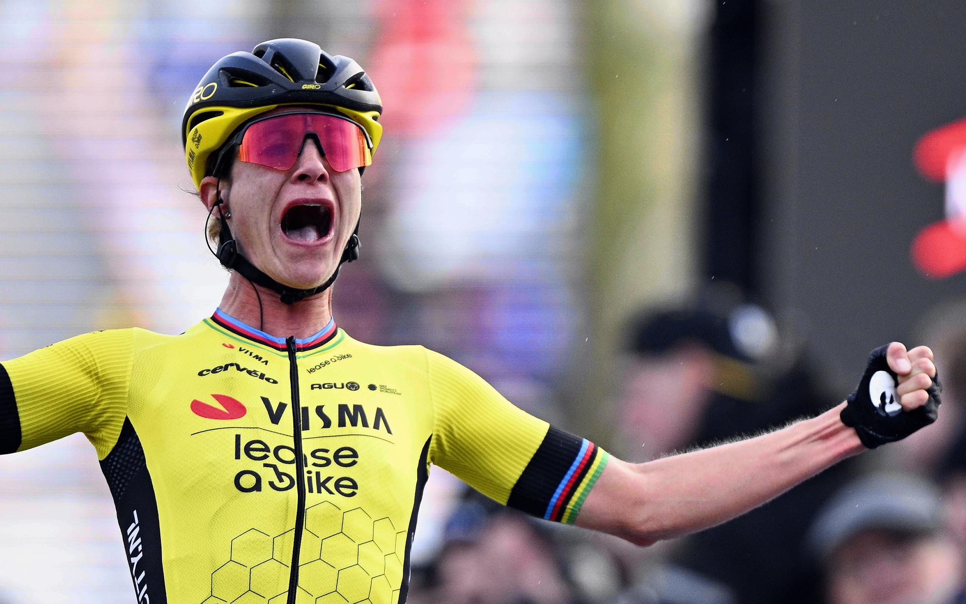 Dutch Marianne Vos of Team Visma-Lease a Bike celebrates after winning the women elite race of the 'Dwars Door Vlaanderen' cycling race, 129,9 km with start and finish in Waregem, Wednesday 27 March 2024. BELGA PHOTO JASPER JACOBS