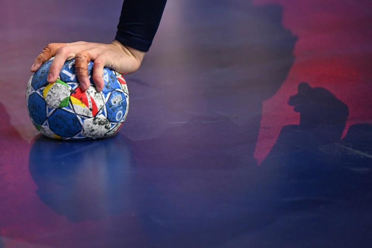 France's centre back #05 Nedim Remili holds the ball during the Men's EURO 2024 EHF Handball European Championship final match between France and Denmark in Cologne, western Germany on January 28, 2024. Kirill KUDRYAVTSEV / AFP