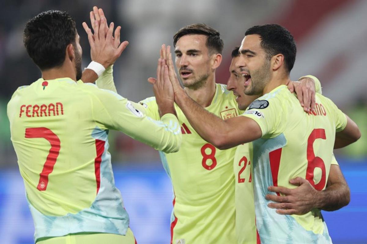 Spain's forward #21 Mikel Oiarzabal celebrates after scoring the opening goal from the penalty spot during the FIFA World Cup 2026 European qualification football match between Georgia and Spain at the Boris Paichadze National Stadium in Tbilisi on November 15, 2025. Giorgi ARJEVANIDZE / AFP
