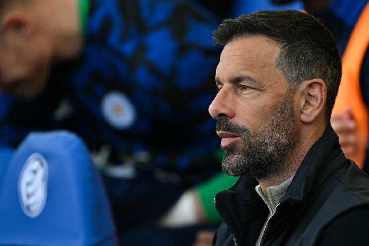 Leicester City's Dutch manager Ruud van Nistelrooy reacts prior to the English Premier League football match between Brighton and Hove Albion and Leicester City at the American Express Community Stadium in Brighton, southern England on April 12, 2025. Glyn KIRK / AFP