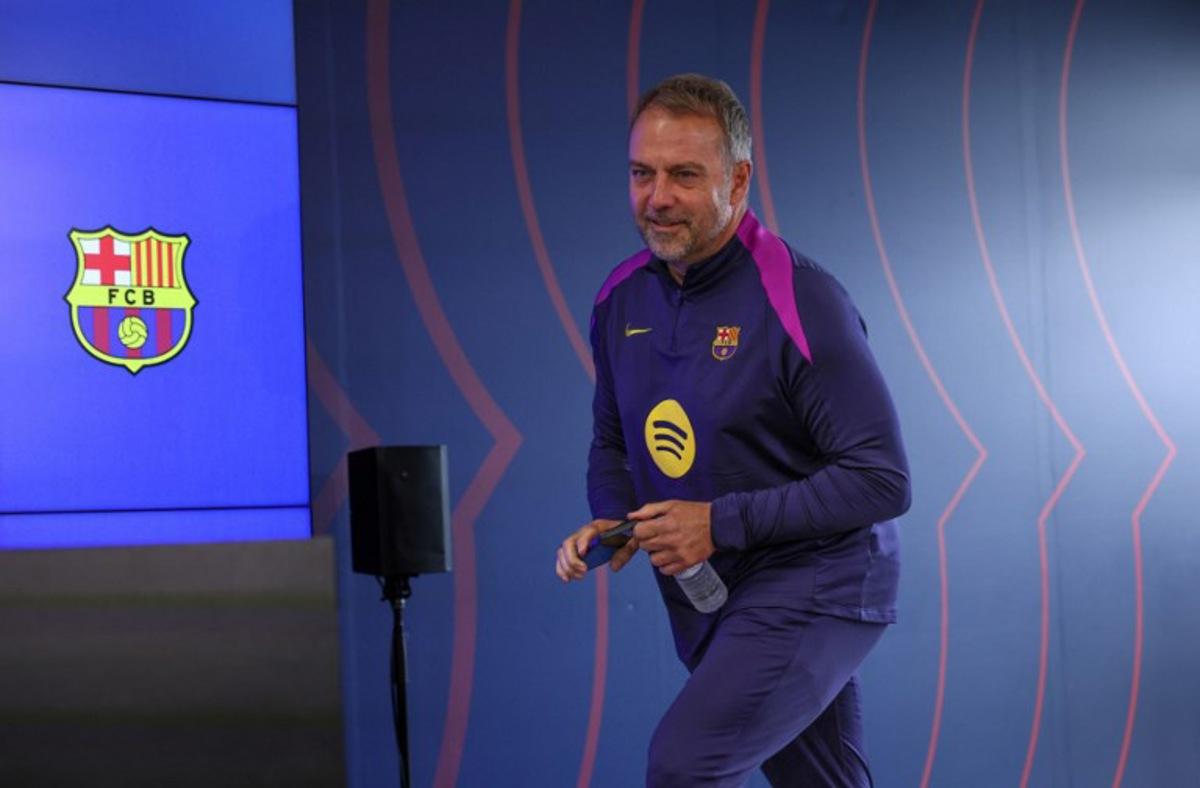 Barcelona's German coach Hans-Dieter Flick arrives to give a press conference on the eve of the Spanish league football match between FC Barcelona and Real Madrid CF at Camp Nou Stadium in Barcelona on May 9, 2026. Lluis GENE / AFP