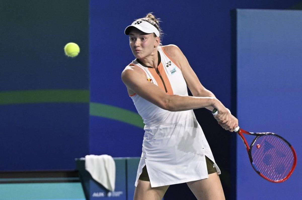 Kazakhstan's Elena Rybakina hits a return to Italy's Jasmine Paolini during their women's singles semi-final match at the WTA Ningbo Open tennis tournamen in Ningbo, in China's eastern Zhejiang province on October 18, 2025. AFP