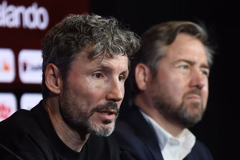 Belgium's head coach Mark van Bommel and Club Brugge's Vincent Mannaert are pictured during a press conference of Belgian national soccer team Red Devils to present their new head coach , on Friday 7 August 2026, at the RBFA headquarters in Tubize. BELGA PHOTO BRUNO FAHY