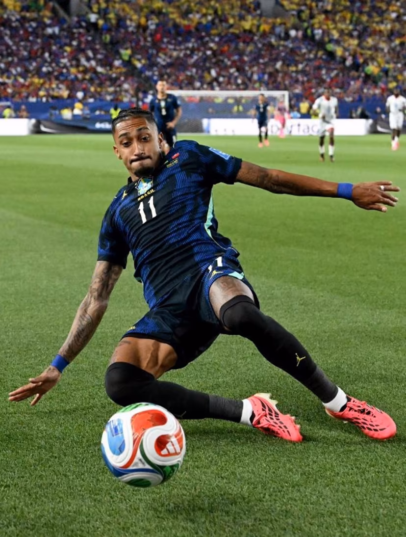 Brazil's forward #11 Raphinha slides for the ball during the 2026 World Cup Group C football match between Brazil and Haiti at the Philadelphia Stadium in Philadelphia on June 19, 2026. ROBERTO SCHMIDT / AFP