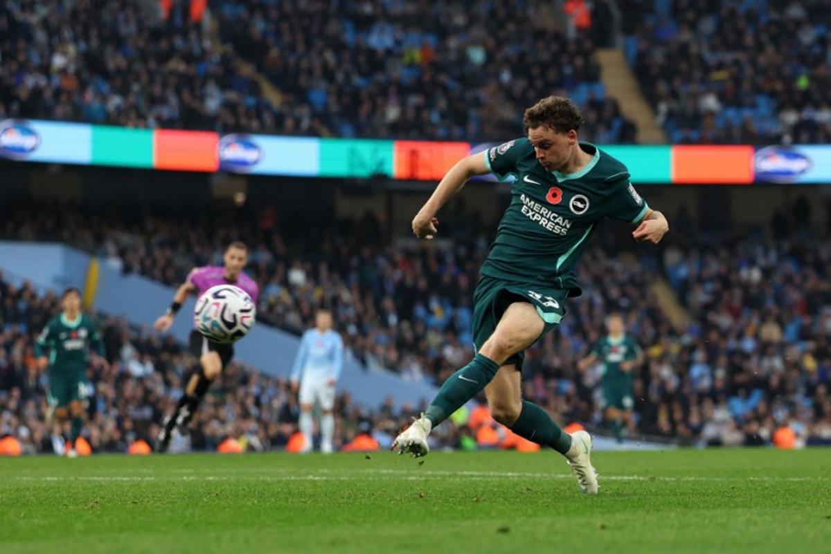 Brighton's Belgian defender #29 Maxim De Cuyper shoots but fails to score during the English Premier League football match between Manchester City and Brighton and Hove Albion at the Etihad Stadium in Manchester, north west England, on October 31, 2026. Darren Staples / AFP