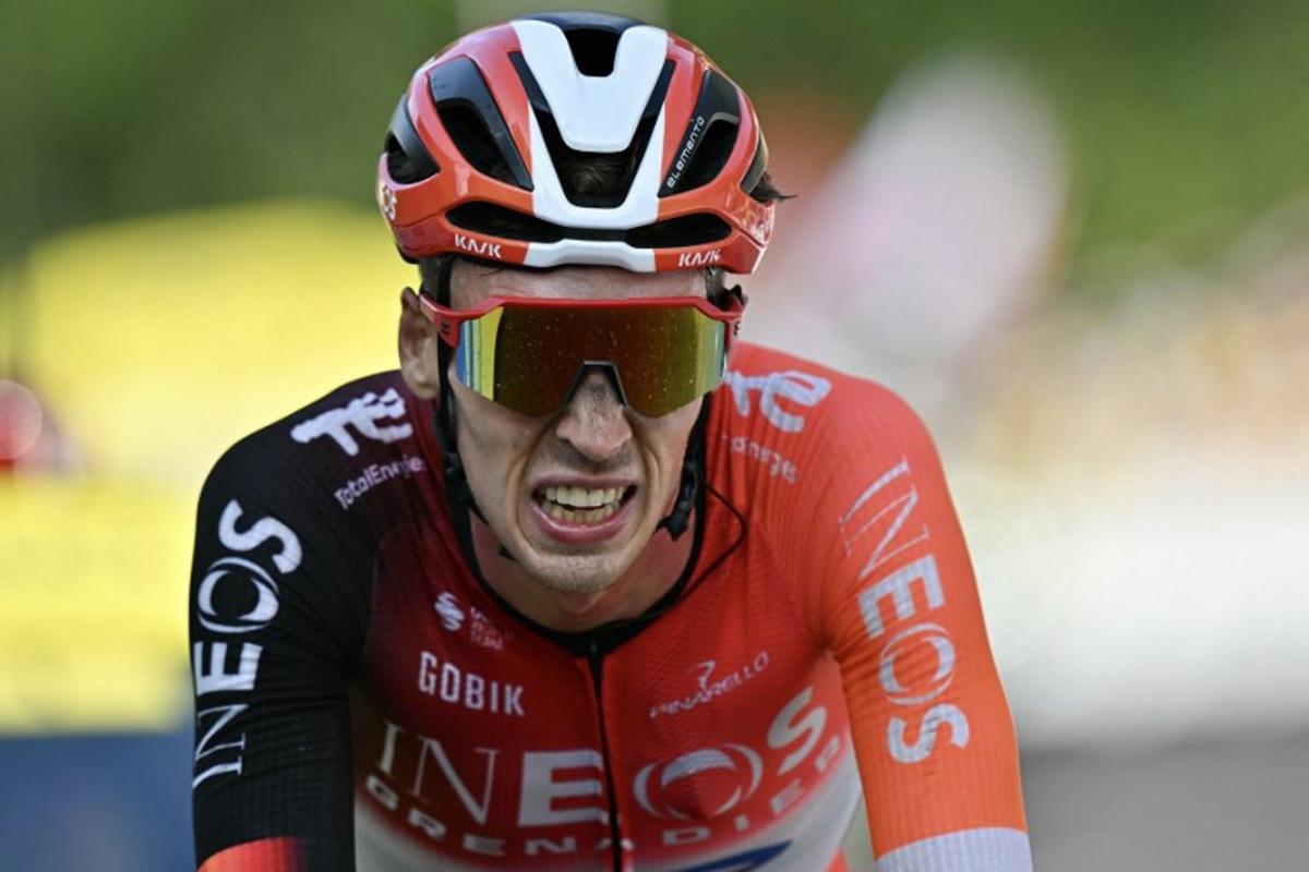 INEOS Grenadiers team's Dutch rider Thymen Arensman cycles to the finish line to place second during the 10th stage of the 112th edition of the Tour de France cycling race, 165.3 km between Ennezat and Le Mont-Dore Puy de Sancy, in central France, on July 14, 2025. Loic VENANCE / AFP