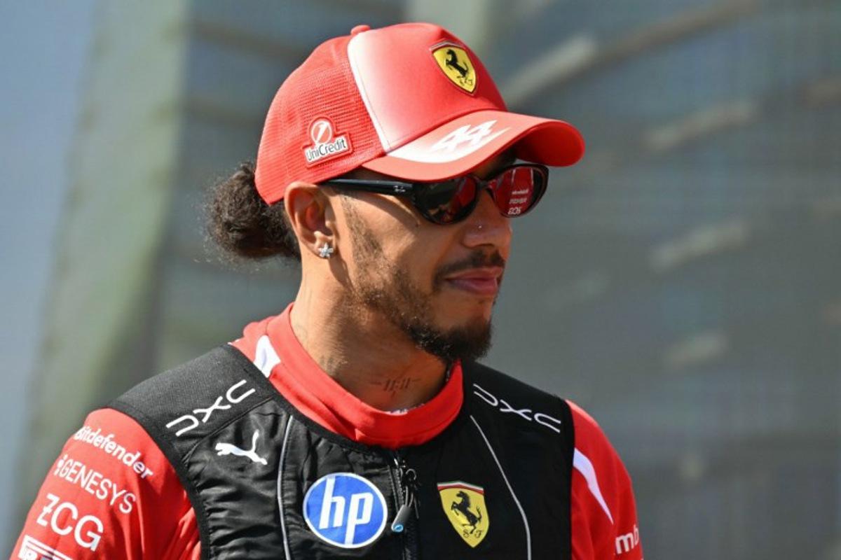 Ferrari's British driver Lewis Hamilton attends the drivers' presentation prior to the Formula One Azerbaijan Grand Prix at the Baku City Circuit in Baku on September 26, 2026. Andrej ISAKOVIC / AFP