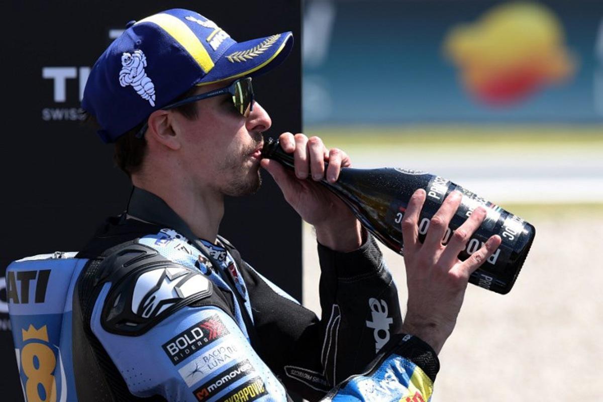 Team Gresini Racing MotoGP's Alex Marquez celebrates winning the Sprint Race at the Catalunya Moto GP Grand Prix at the Catalunya racetrack in Montmelo, near Barcelona, on May 16, 2026. Lluis GENE / AFP