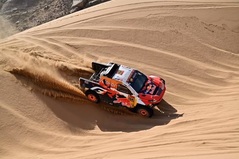Toyota Gazoo Racing W2rc's Australian driver Toby Price and Spanish copilot Armand Monleon compete in Stage 12 of the 48th edition of the Dakar Rally 2026, between al-Henakiyah and Yanbu, Saudi Arabia, on January 16, 2026. Giuseppe CACACE / AFP