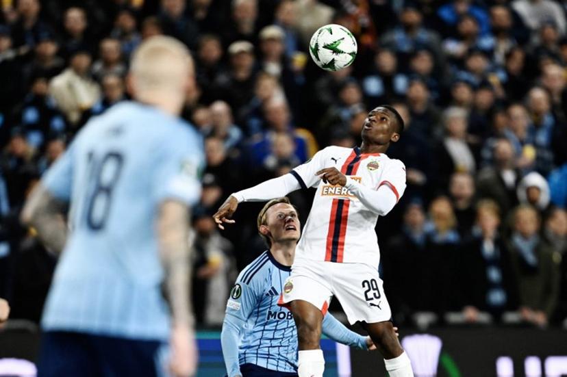 Djurgarden's Tobias Gulliksen and Rapid Vienna's Romeo Amane vie for the ball during the quarter-final Conference League football match 1 of 2, between Djurgården and SK Rapid Vienna in Stockholm on April 10, 2025. Pontus LUNDAHL / TT NEWS AGENCY / AFP