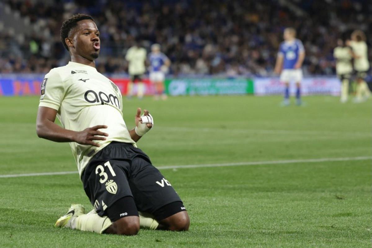 Monaco's Spanish forward #31 Ansu Fati celebrates scoring his team's third goal during the French L1 football match between RC Strasbourg Alsace and AS Monaco at the Stade de la Meinau in Strasbourg, eastern France, on May 17, 2026. ROMEO BOETZLE / AFP