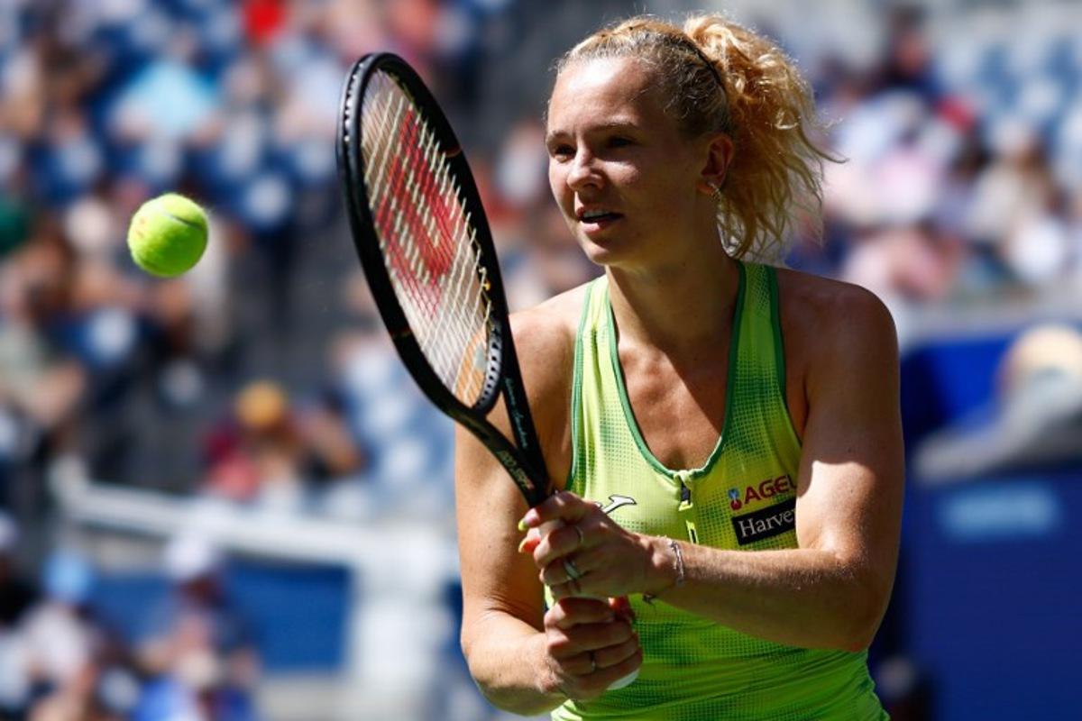 Czech Republic's Katerina Siniakova hits a return to Japan's Naomi Osaka during their women's singles second round tennis match on day five of the US Open tennis tournament at the USTA Billie Jean King National Tennis Center in New York City on September 3, 2026. kena betancur / AFP