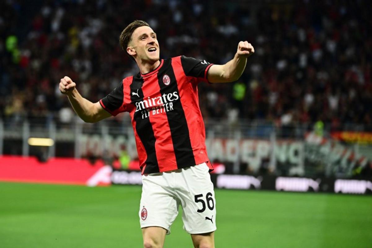 AC Milan's Belgian midfielder #56 Alexis Saelemaekers celebrates after scoring his team's first goal during the Italian Serie A football match between AC Milan and Cagliari at the San Siro Stadium in Milan on May 24, 2026. Piero CRUCIATTI / AFP