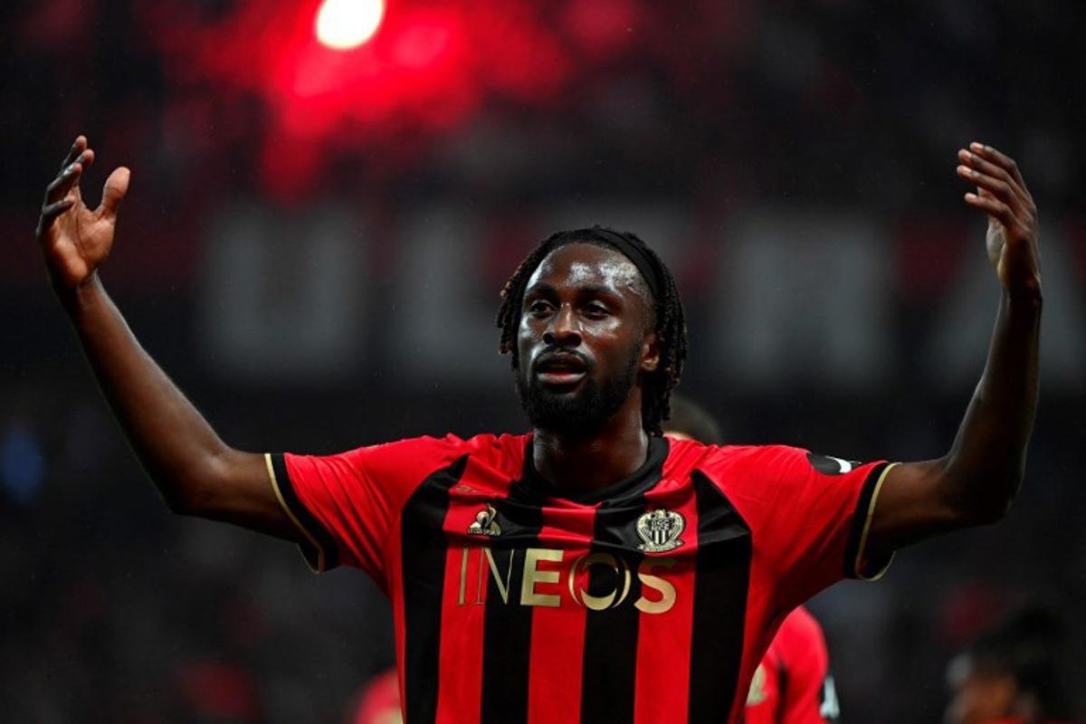 Nice's Ivorian forward #29 Evann Guessand celebrates after scoring a goal during the French L1 football match between OGC Nice and Stade Brestois 29 (Brest) at the Riviera Stadium in Nice, south-eastern France, on May 17, 2025. Sylvain THOMAS / AFP