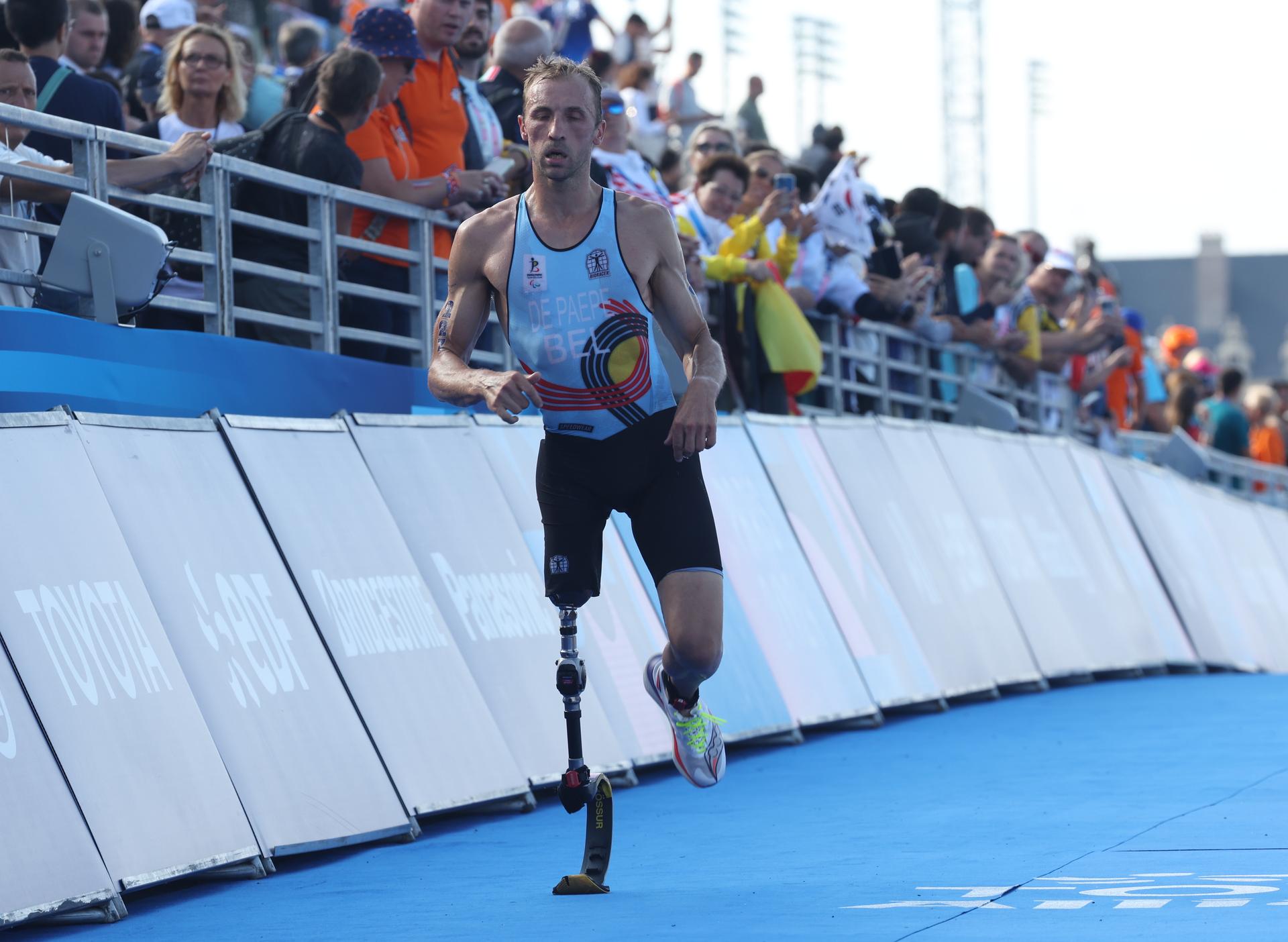 Belgian Wim De Paepe crosses the finish line at the Men Individual PTS2 triathlon event, on day 6 of the 2024 Summer Paralympic Games in Paris, France on Monday 02 September 2024. The 17th Paralympics are taking place from 28 August to 8 September 2024 in Paris. BELGA PHOTO VIRGINIE LEFOUR