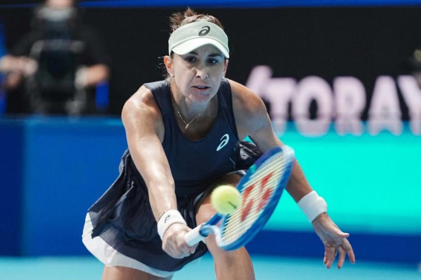 Switzerland's Belinda Bencic hits a return against USA's Sofia Kenin during their women's singles semi-finals at the Pan Pacific Open tennis tournament in Tokyo on October 25, 2025.   Kazuhiro NOGI / AFP