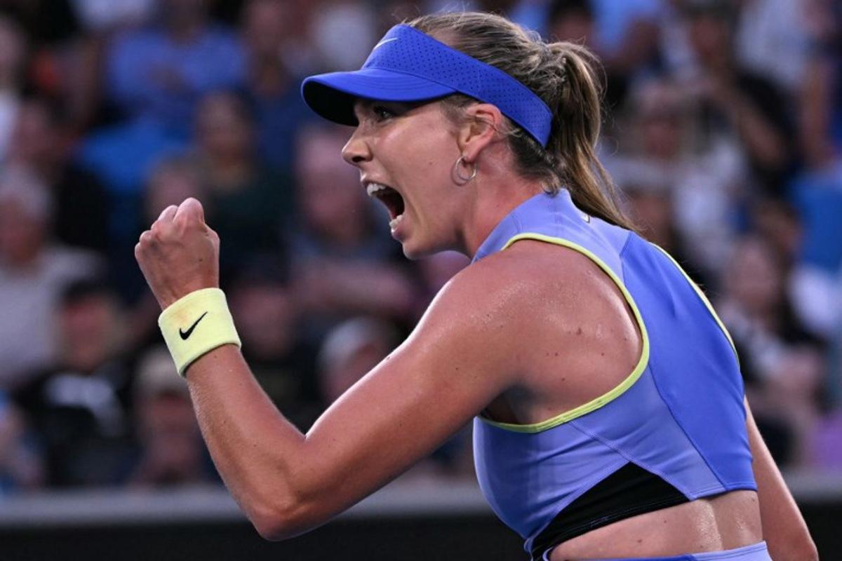Britain's Katie Boulter reacts after a point against Switzerland's Belinda Bencic during their women's singles match on day three of the Australian Open tennis tournament in Melbourne on January 20, 2026. WILLIAM WEST / AFP