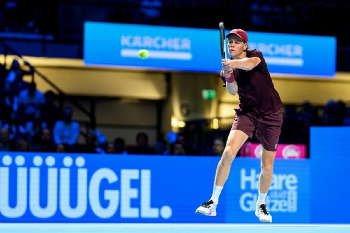 Italy's Jannik Sinner returns the ball to Australia's Alex de Minaur during the men's semi-final singles match at the ATP Vienna Open tennis tournament in Vienna, Austria, on October 25, 2025. MAX SLOVENCIK / APA / AFP