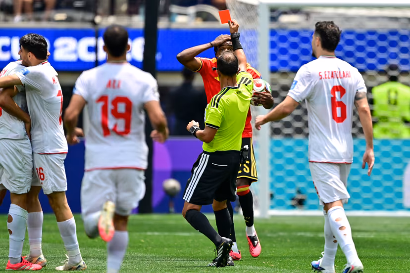 Belgium's Nathan Ngoy receives a red card from the referee during a soccer game between Belgian national team Red Devils and Iran, on Sunday 21 June 2026, at the SoFi stadium in Los Angeles, the second game in the group stage of the FIFA World Cup 2026 in the United States of America. The Diables Rouges - Rode Duivels were drawn into Group G. BELGA PHOTO DIRK WAEM
