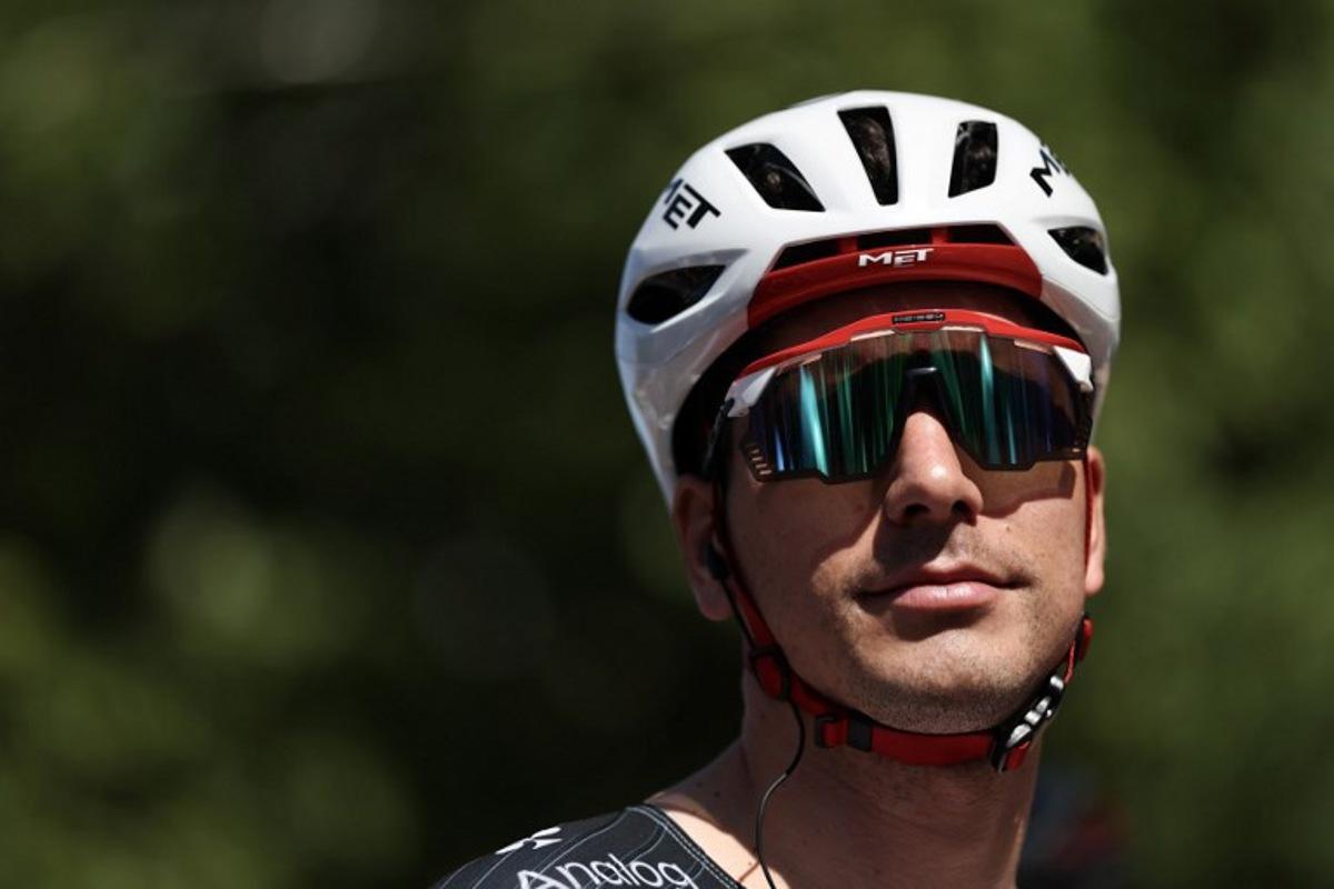 UAE Team Emirates XRG's Portuguese rider Joao Almeida awaits the start of the 2nd stage of the Tour Auvergne-Rhone-Alpes cycling race (formerly known as the Criterium du Dauphine), 234,3km between Saint-Martin-Le-Vinoux and Le Puy-en-Velay, in the French Alps, on June 8, 2026. Anne-Christine POUJOULAT / AFP