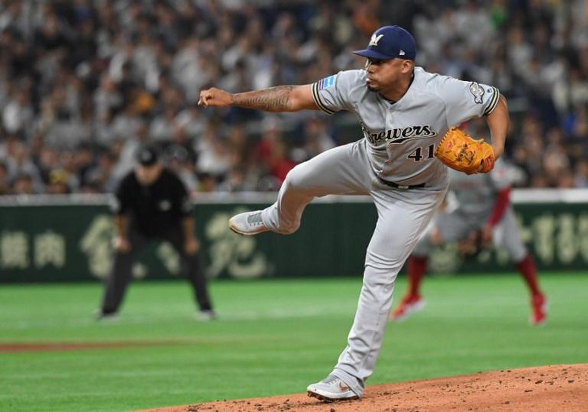 Milwaukee Brewers' Junior Guerra pitches during the first inning of the first exhibition baseball game between the US Major League Baseball All Star team and the Japanese national team at the Tokyo Dome in Tokyo on November 9, 2018. TOSHIFUMI KITAMURA / AFP