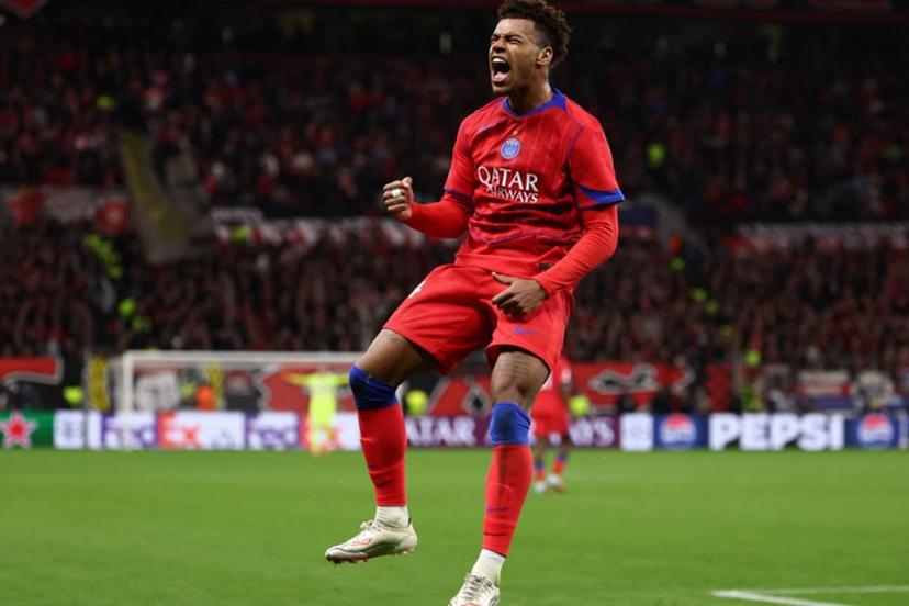 Paris Saint-Germain's French midfielder #14 Desire Doue celebrates scoring the 1-4 goal during the UEFA Champions League football match between Bayer 04 Leverkusen and Paris Saint-Germain (PSG) at the BayArena stadium in Leverkusen, western Germany on October 21, 2025. FRANCK FIFE / AFP