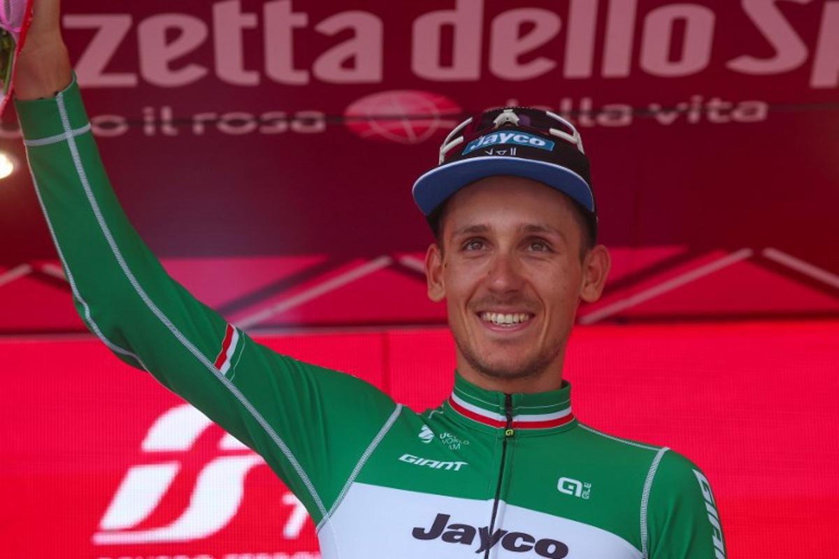 Team Jayco AlUla's Filippo Zana rider celebrates on the podium after winning the eighteenth stage of the Giro d'Italia 2023 cycling race, 161 km between Oderzo and Val di Zoldo, on May 25, 2023. . Luca Bettini / AFP