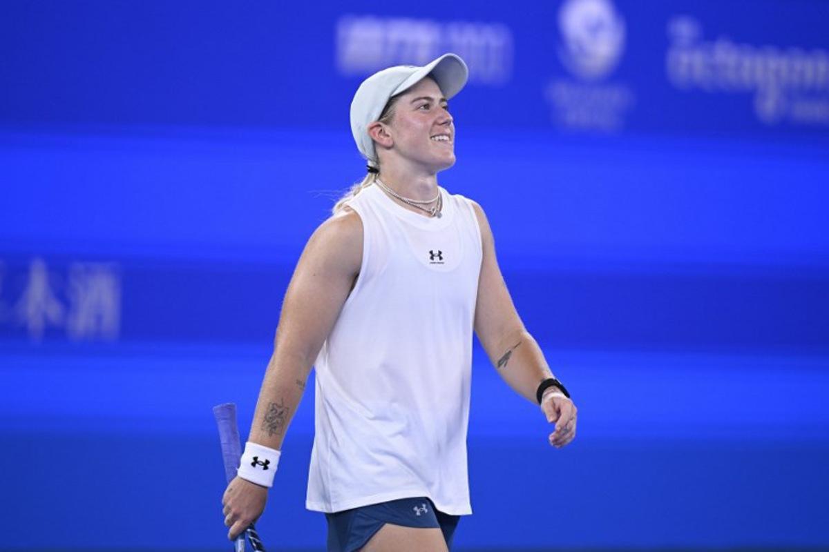 Britain's Sonay Kartal reacts after winning against Ukraine's Elina Svitolina during their women's singles quarter-final match at the Wuhan Open tennis tournament in Wuhan, China's Hubei province on October 16, 2026. WANG Zhao / AFP