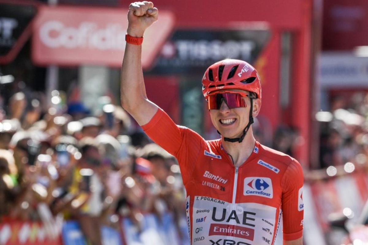Team UAE's Slovenian rider Tadej Pogacar celebrates as he crosses the finish line to win the fourth stage of the Vuelta a Espana 2026, a 104,8 km race between Andorra-la-Vella and Andorra-la-Vella on August 25, 2026. Ed JONES / AFP