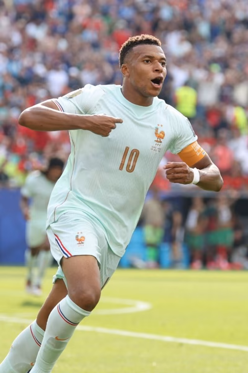 France's forward #10 Kylian Mbappe celebrates scoring his team's first goal during the 2026 World Cup football tournament quarter-final match between France and Morocco at Boston Stadium in Foxborough on July 9, 2026. Odd ANDERSEN / AFP
