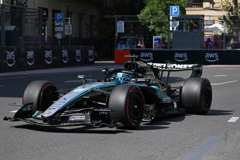 Mercedes' British driver George Russell steers his car during the first practice session ahead of the Formula One Azerbaijan Grand Prix at the Baku City Circuit in Baku on September 24, 2026. Igor IVANKO / AFP