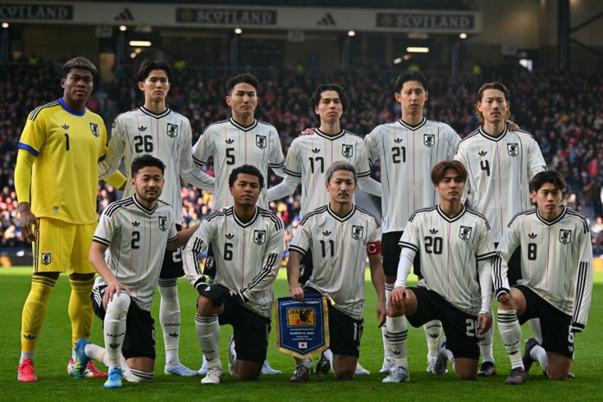(Back row L-R) Japan's goalkeeper Zion Suzuk, Japan's forward Keisuke Goto, Japan's defender Tsuyoshi Watanabe, Japan's midfielder Ao Tanaka, Japan's defender Hiroki Ito and Japan's defender Ayumu Seko, (front row L-R) Japan's defender Yukinari Sugawara, Japan's midfielder Joel Chima Fujita, Japan's forward Daizen Maeda, Japan's midfielder Kodai Sano and Japan's midfielder Yuito Suzuki pose for a team photo ahead of the friendly International football match between Scotland and Japan at Hampden Park, in Glasgow, on March 28, 2026. ANDY BUCHANAN / AFP